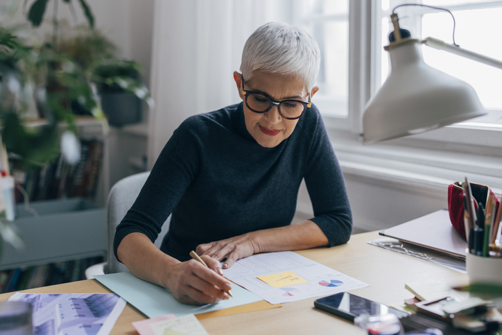 A senior researching the rules for a 401k-to-IRA rollover.